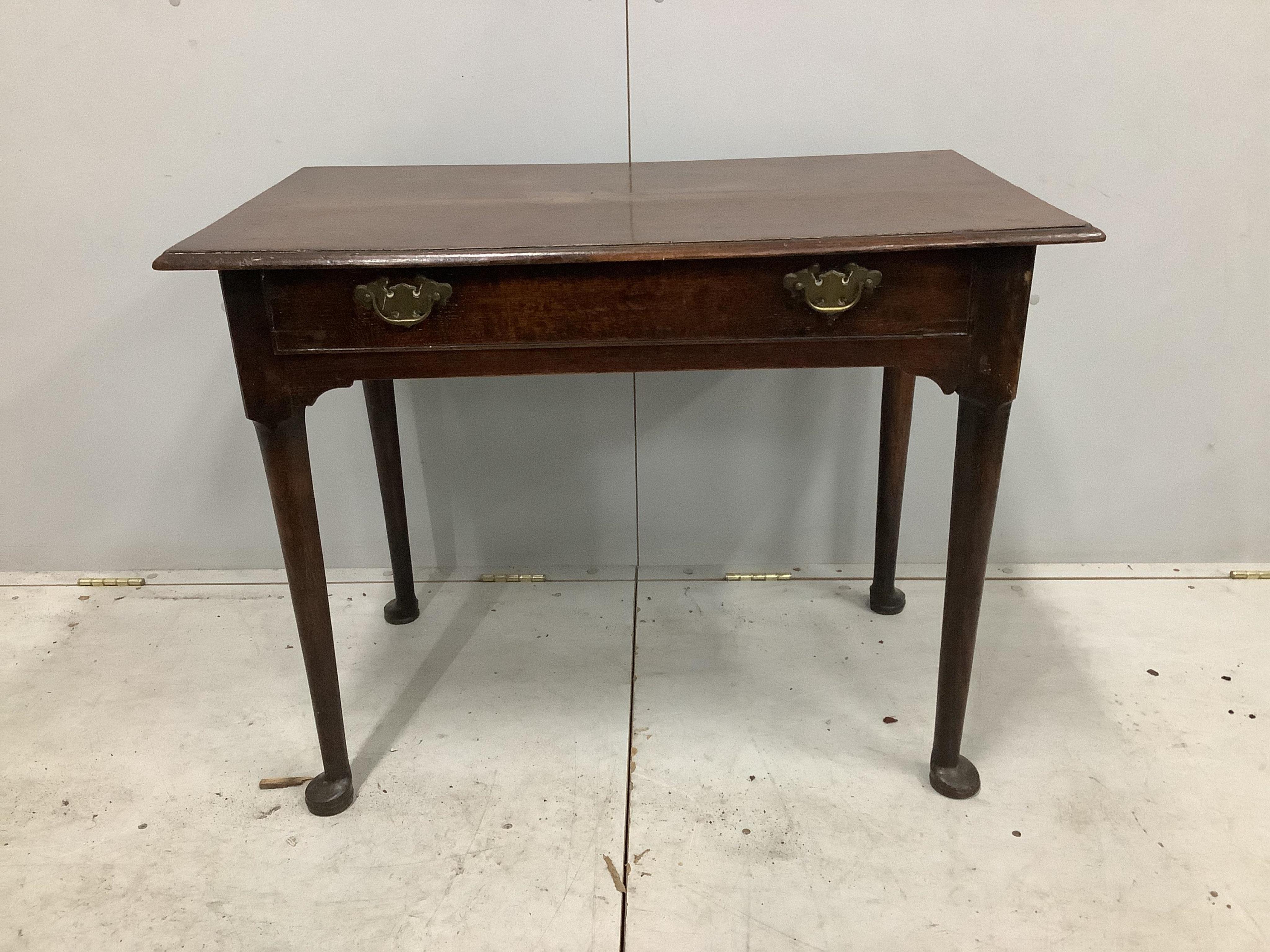 A George III oak side table fitted drawer on pole turned legs with pad feet, width 90cm, depth 54cm, height 69cm. Condition - fair